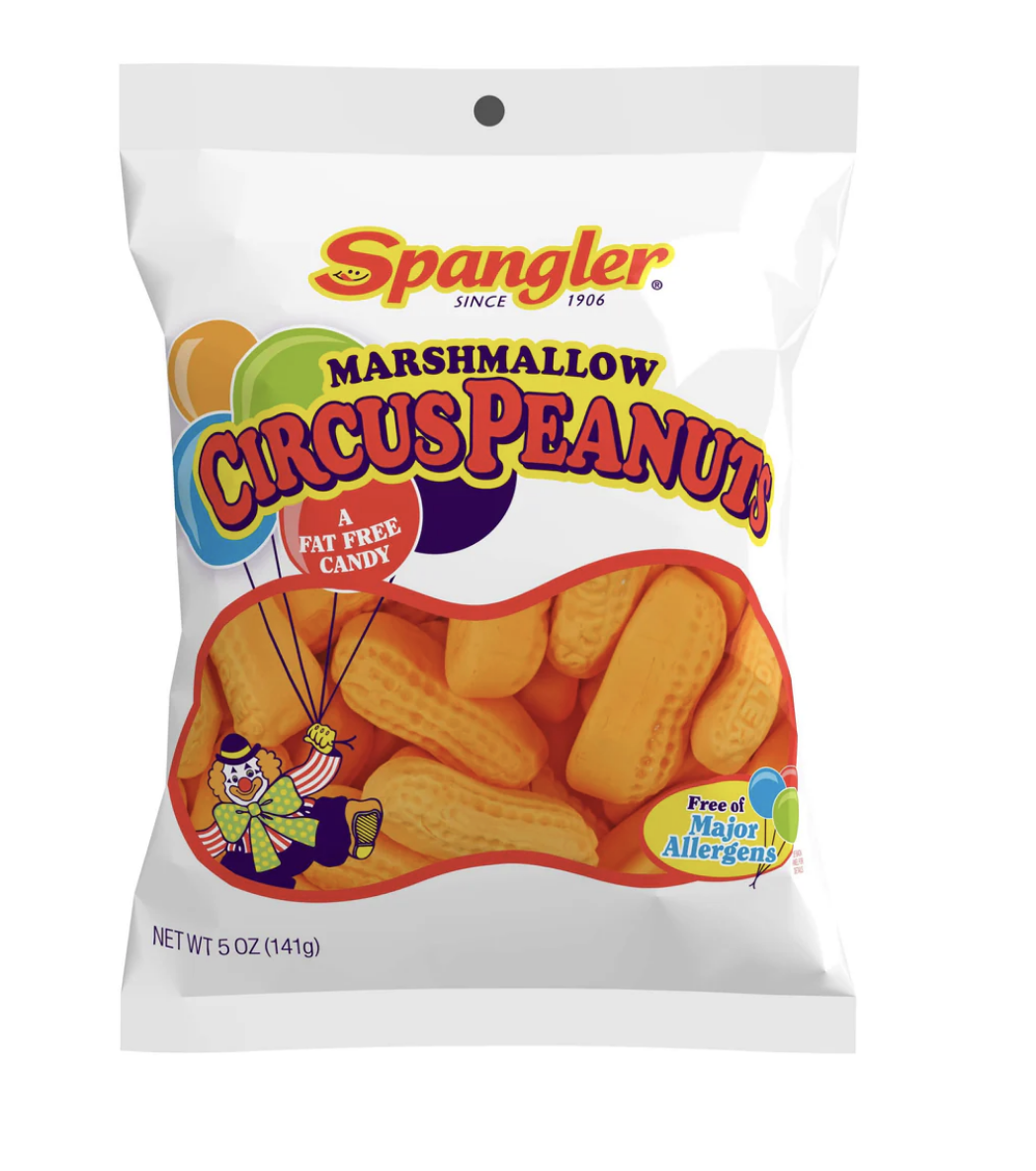 An image of a white package that says "Spangler Marshmallow Circus Peanuts." Theyre is a clown holding baloons also on the package, along with an image of the orange circus peanuts enclosed.