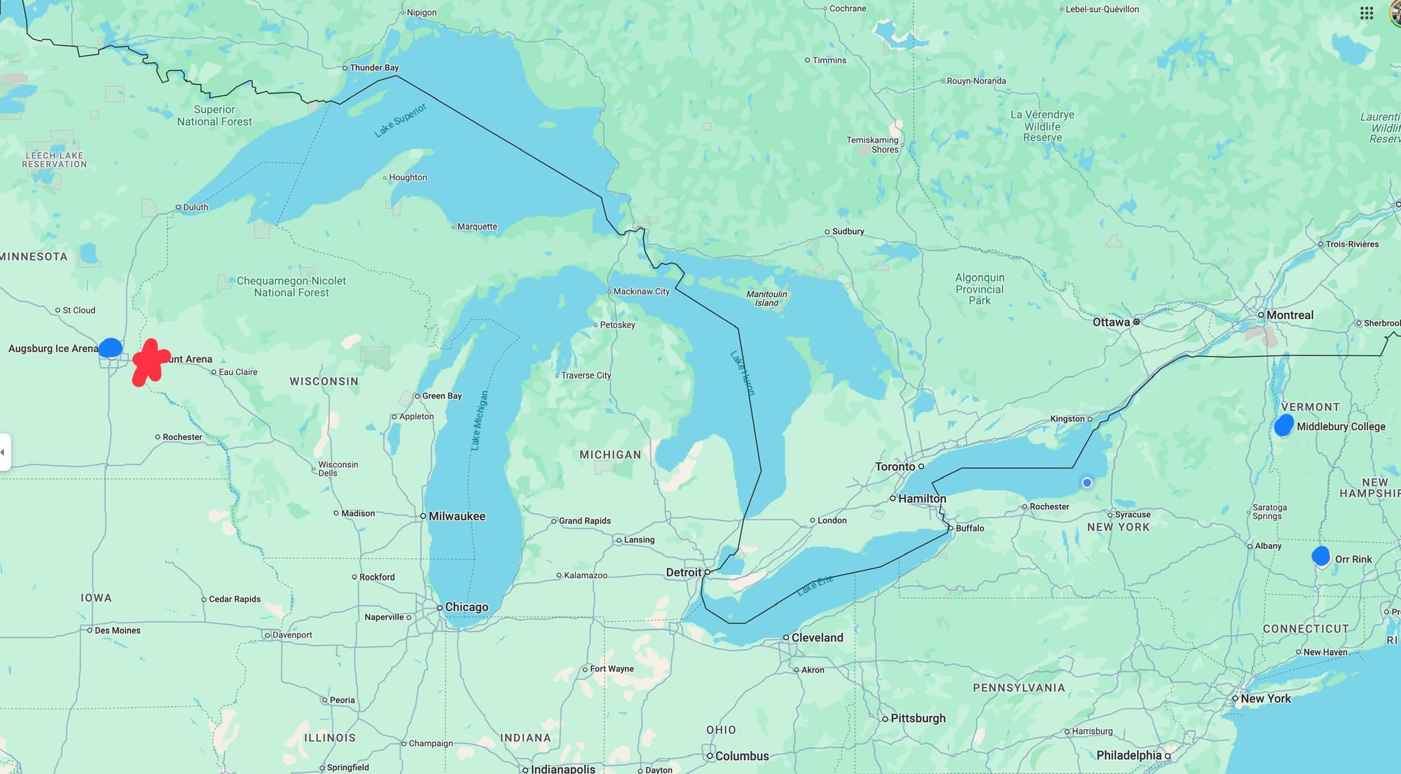 A map of a portion of the United States. A blue dot is close to a red star near the western edge of the map. Two other blue dots are near the eastern edge of the map.