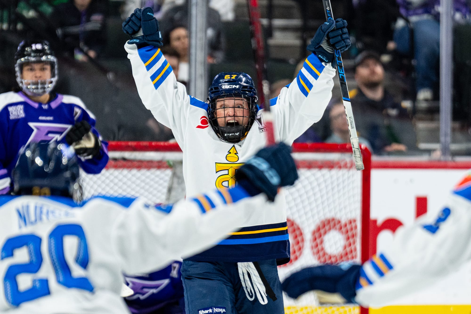 Emma Maltais celebrates a goal