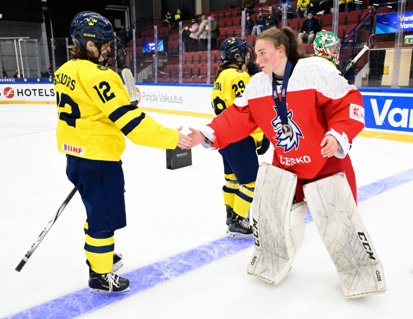 Sweden shakes the hands of Czech players after losing in the 2025 U18 Bronze Medal Game