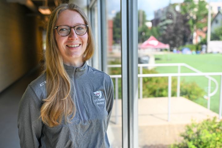Stefanie McKeough wearing a grey uOttawa hockey sweater