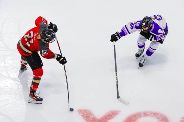 Ashton Bell looks to shoot the puck