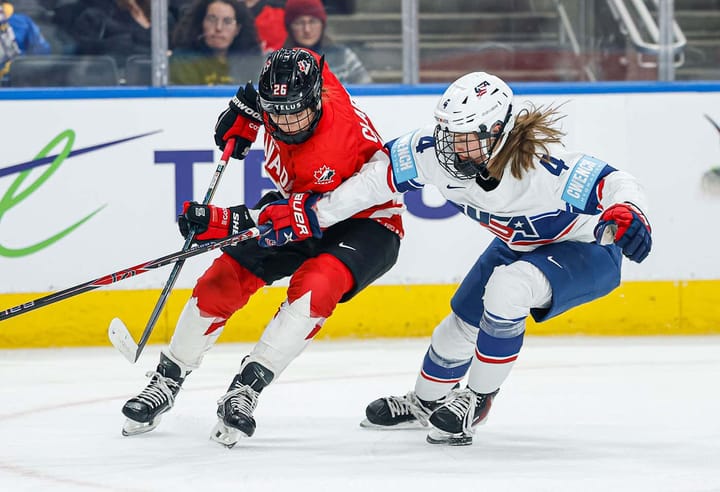 Emily Clark fights off Caroline Harvey